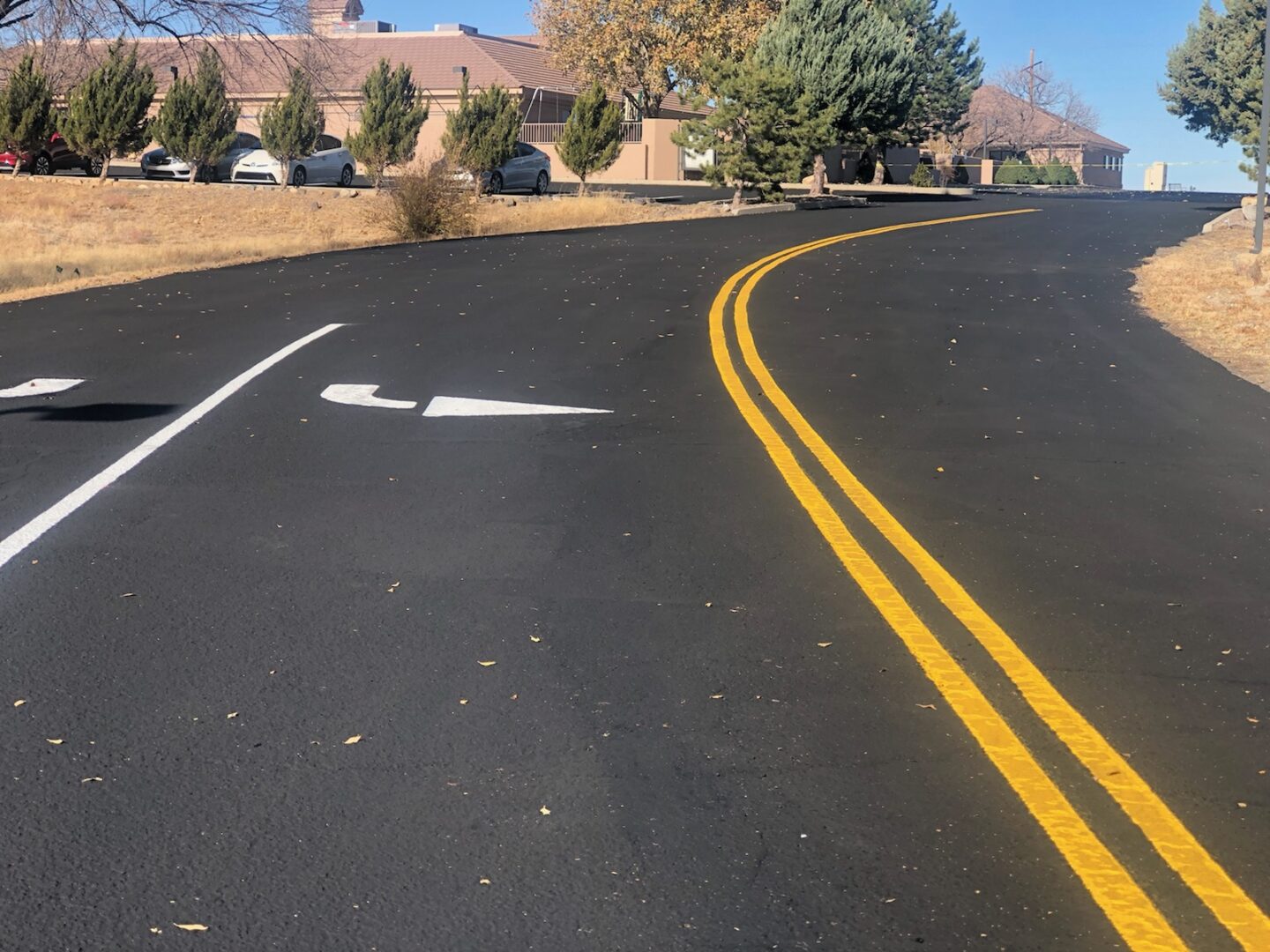 Fresh asphalt paving driveway installation in Prescott, AZ.